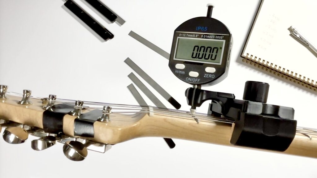 DL Action Finder on a guitar neck